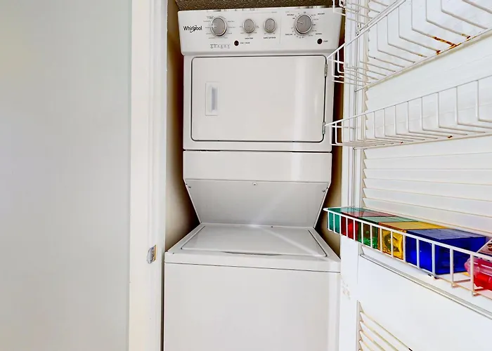 Holiday home Roomy Is Located On The Second Floor Of Buena Vista An Oceanfront With A Balcony Pool Gated Access To The And Washer Dryer
