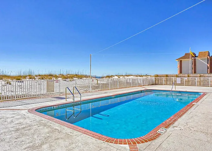 Holiday home Roomy Is Located On The Second Floor Of Buena Vista An Oceanfront With A Balcony Pool Gated Access To The And Washer Dryer Gulf Shores